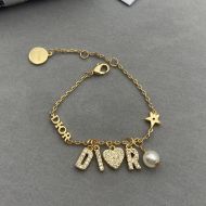 Diorevolution Bracelet Metal with Resin Pearl, Star Charm and DIOR Signature Embellished Crystals Gold