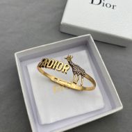 J'Adior Hinge Bangle Metal with J'Adior Signature and Giraffe Charm Embellished Crystals Gold